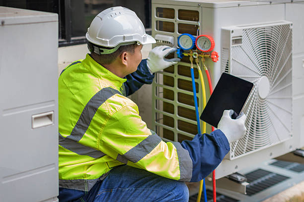Professional Hvac Maintenance technician working in Elfers, FL